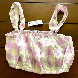 Cropped top with straps. Kendall and Kylie brand from PAC Sun. Size small. NWTG